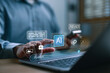 © Looker_Studio - Man interacting with AI chatbot prompt on laptop, representing artificial intelligence, generative AI technology, virtual assistant and smart content creation interface. Multimedia technology.