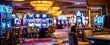 © Dovhas - The casino interior with colorful slot machines and empty gaming tables at night