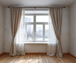 © SUNDAY - A spacious room features light beige curtains and sheer panels framing a window with a view of a cityscape on a slightly overcast day.