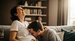 © Clifford - pregnant woman laughing with partner kissing her baby bump