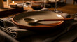 © Nancy - Elegant Table Setting With Plate, Spoon, And Warm Candle Light, A Culinary Delight