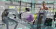 © vectorfusionart - Rowing partners in sportswear powering machines in gym, with purple ball and stock ticker
