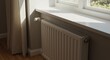 © Vyatcheslav - A white central heating radiator with a thermostatic valve under a sunlit window. Modern home interior with temperature control. Energy efficiency concept.