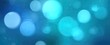 © anwar - Abstract bokeh lights in shades of teal and blue