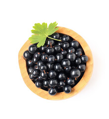Wall Mural - wooden bowl with fresh black currants on white background