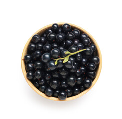 Wall Mural - wooden bowl with fresh black currants on white background