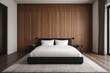 A sleeping area featuring a dark bed frame and light bedding placed directly on the ground, positioned before a sizable entrance