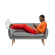 © Ramdan - Stylish african american man relaxing on couch with smartphone in studio ambiance