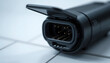 © unairakstudio - A detailed close-up on an electric vehicle's charging port, revealing the intricate rubber seal and connection pins.
