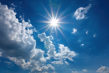 Wall Mural - Bright sunburst in a blue sky dotted with fluffy white clouds creates a serene and uplifting atmosphere. Sunlight illuminates the sky