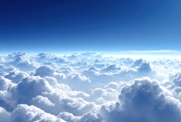 Wall Mural - An aerial view displays billowy, white clouds filling the sky, contrasted against a deep azure expanse above. Light filters through