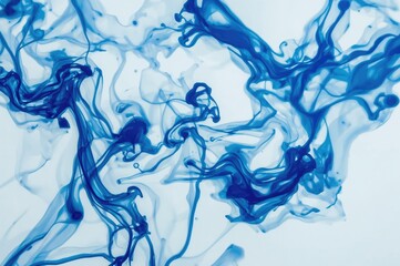 Wall Mural - white and blue inks swirling together in water, perfect for creating flowing, organic backgrounds or