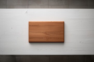 Wall Mural - Overhead view of a chopping board placed on a white wooden surface