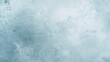© vxnaghiyev - Scratched dust effect with distressed overlay and worn texture in light blue and white frost patterns on aged glass abstract background with empty area.