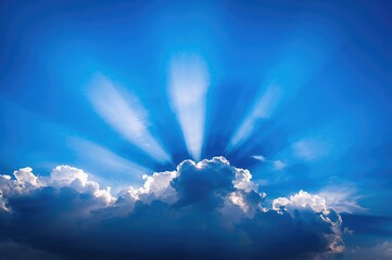 Wall Mural - stunning azure sky illuminated by radiant sunlight and fluffy clouds