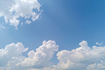 Wall Mural - Sky with soft white clouds and light blue hues