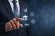 © The Little Hut - Banking Technology Concept: Businessman Interacting with Digital Bank Icons for Secure Financial Transactions and Investment Growth