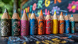 © stock - Colorful pencils with child drawings, outdoors, chalkboard background, educational