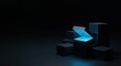 © Sergiy - A dark, minimalist scene features several black boxes stacked on the right, with one central box partially open, emitting a vibrant blue glow into the dim environment, offering ample copy space.