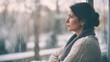 © VistaVisions - Winter depression, seasonal affective disorder mental health woman sad comtemplative looking out the window alone