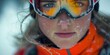 © Artem - A woman in ski goggles covered in snow, ready to embrace the cold winter.