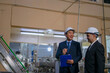 © Suney - Employees are working at canned fish factory.