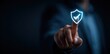 © num lock - Hand touches glowing shield with checkmark on a dark blue background. Conceptual tech image illustrating digital safety, security, protection, and verification