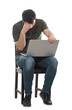 © 1STunningART - Disappointed man seated with laptop on knees, hand to forehead looking down upset. Stressed freelancer or programmer guy, mess in head, anxiety and headache feeling, isolated full length portrait