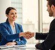 © picturehome - Business handshake of happy female hr, bank manager, financial advisor and male recruit, partner or insured client. Consulting meeting deal. Hiring at job interview, partnership, corporate agreement.