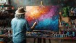 © Dmitry - An artist passionately paints a canvas filled with vivid hues, immersed in creativity in a lively art studio