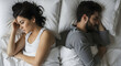 © Karmiyem - Couple in bed facing away showing relationship problems sadness upset disagreement conflict separation heartbreak loneliness emotional distress