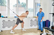 © LIGHTFIELD STUDIOS - Physical therapy session at rehabilitation center between doctor and patient in progress