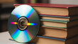 © Sabbir - Stack of old books next to a shiny cd disc with rainbow reflections