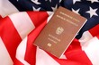 Austria passport on big waving flag of United States of America. US Visa and immigration