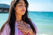 © boryanam - Beautiful  woman breathing fresh air on the beach. Breathing exercises