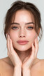 © Yeager Arts - Beautiful woman with clear skin and hands on face