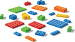 © Anila - Colorful building blocks scattered on white background invite creative fun and imaginative play time
