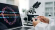 © hsa1 - Scientist analyzing genetic data on laptop alongside microscope in modern laboratory setting