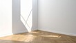 © Arviz - Bright empty room corner with white walls and wooden parquet floor illuminated by natural sunlight casting geometric shadows.