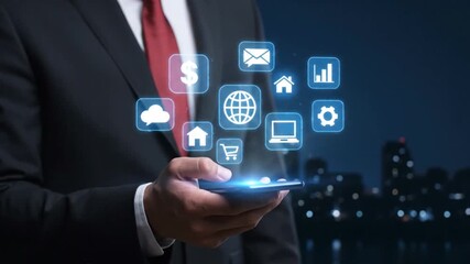 Businessman holding a smartphone with glowing digital icons representing cloud computing internet communication and technology services floating above