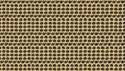 Close up of a textured woven fabric with a repeating pattern of small holes