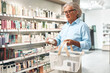 © Valerii Apetroaiei - Senior man shopping in pharmacy aisle