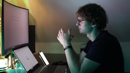 Student communicates with neural network moving hands in front of glowing monitor reflecting live conversation online learning artificial intelligence support and future innovation