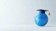 © anita - Graduation cap on a blue globe.