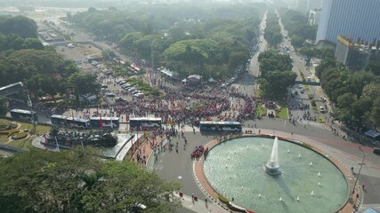 Wall Mural - Indonesia Independence Day Procession Jakarta Marching Near Thamrin Fountain Drone Rise 4K 60FPS