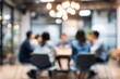 © liu - Blur a group of employees are sitting in a meeting and listening to what their boss is saying about business in the organization in the small meeting room at the office in the morning. High quality