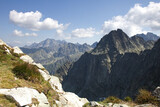 High Tatras, Slovakia,  high mountain landscape, mountains hut. Mountain landscape. European mountains Tatras mountains. Mountains tops in the clouds, blue sky. The Tatra Mountains. The tops of the mo
