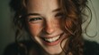 © Jakael - Radiant Joy: A Close-Up Portrait of a Smiling Woman with Freckled Skin