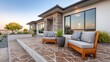 © Irina B - Elegant outdoor living space featuring luxurious stamped concrete patio and stylish seating for modern relaxation and entertaining