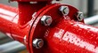 © loxia stock image - Wet Red Industrial Pipe with Shiny Bolts and Water Droplets Close-Up
